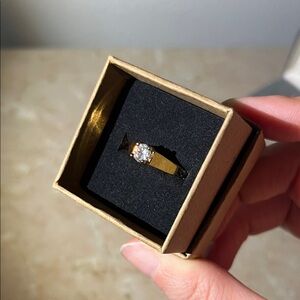 Elegant Gold Ring with Clear Stone